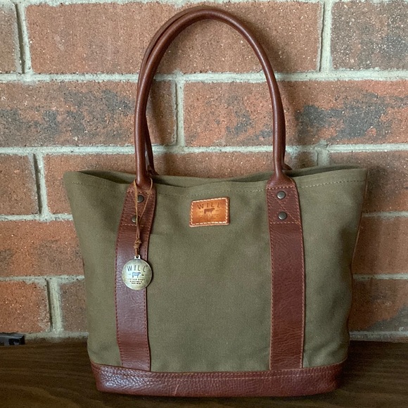 Will Leather Goods Handbags - Will canvas and leather shoulder bag with unused travel pillow.